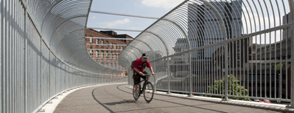 Cyclist on the completed bridge